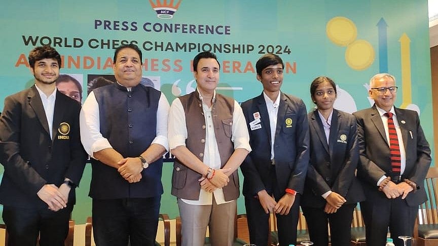 Photo: X | Chess Base India : Former AICF Secretary Bharat Singh Chauhan (2nd from Left) during a press conference of the World Chess Championship 2024.